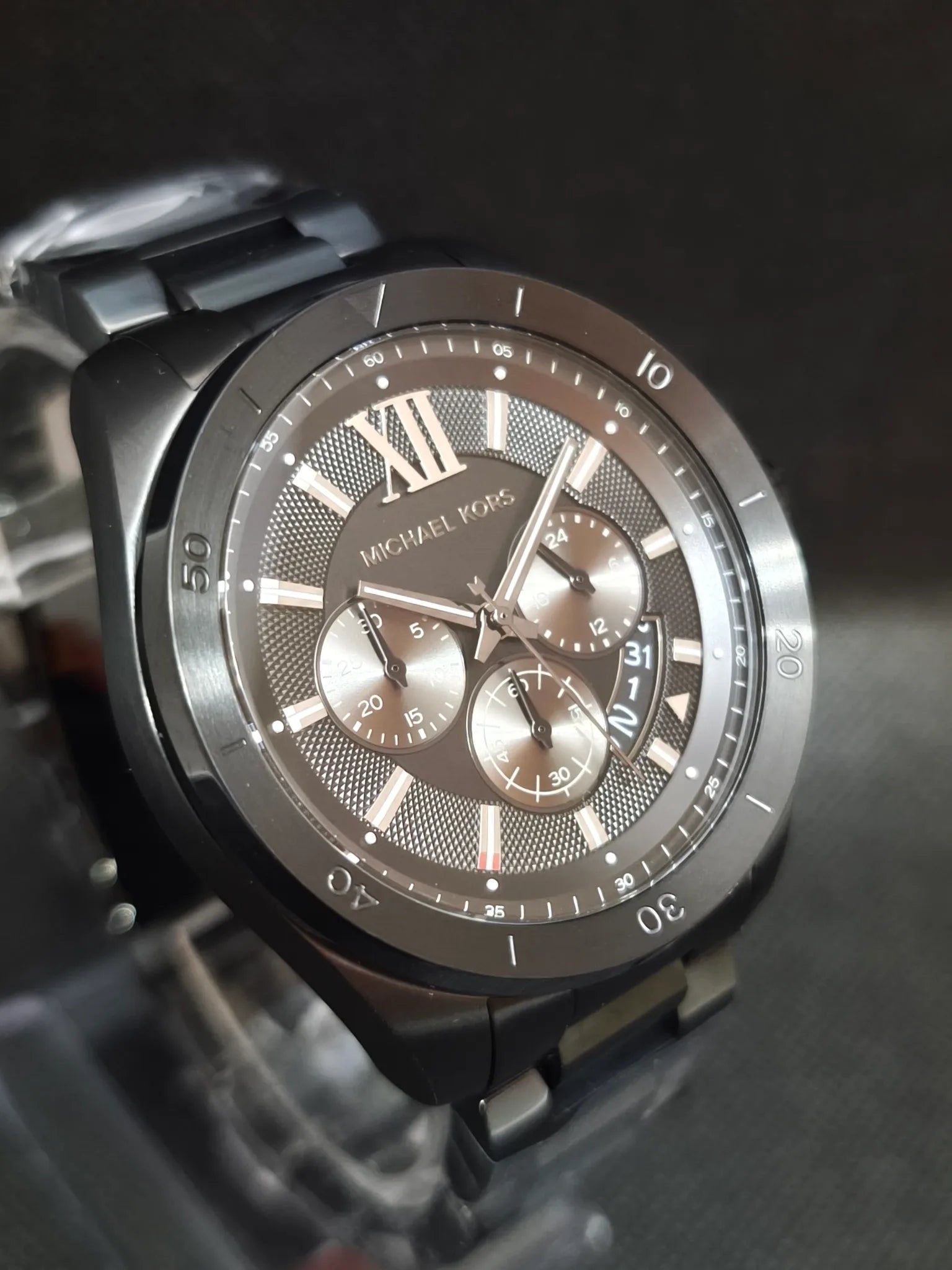 Reloj Michael Kors MK8858 lateral opuesto mostrando el perfil de la caja