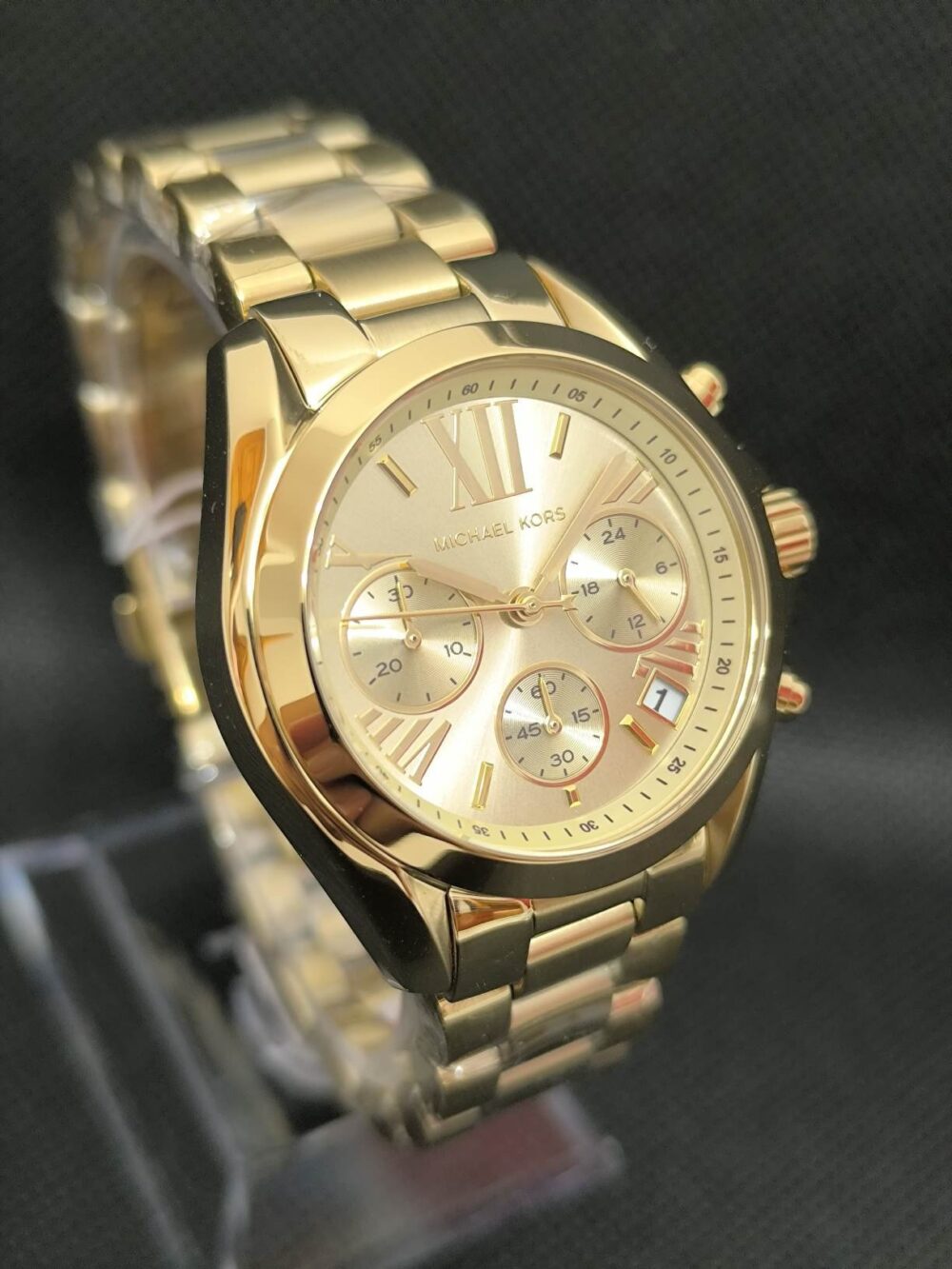 Reloj Michael Kors Bradshaw MK5798 cronógrafo mujer, con caja dorada de 36 milímetros.