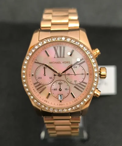 Reloj Michael Kors MK7242 Lexington con caja en oro rosa, cronógrafo y correa de acero inoxidable y resistencia al agua de 10 ATM.